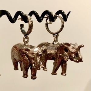 Pair of Susan Cummings sterling silver elephant earrings.